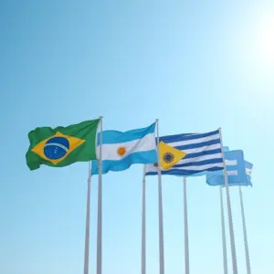 Bandeiras dos países do Mercosul (Brasil, Argentina, Uruguai e Paraguai) tremulando juntas.