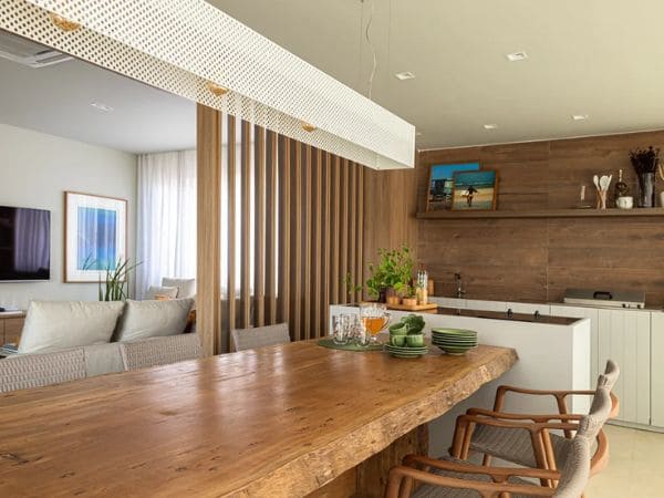 decoração de sala de estar e jantar integradas com balcão