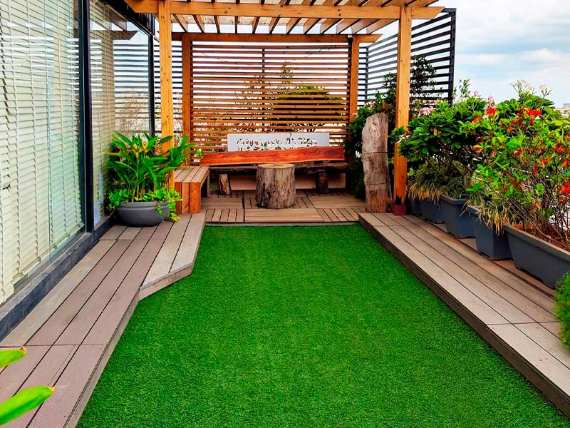 Como escolher a altura ideal da grama sintética para seu jardim