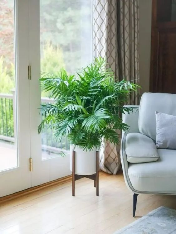 decoração de sala com plantas artificiais