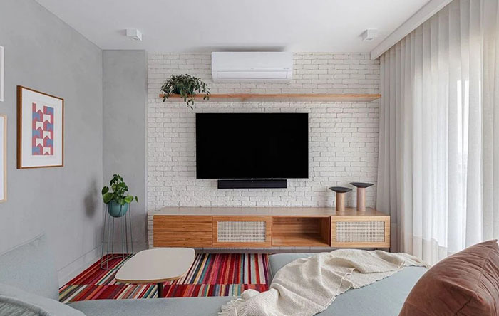 decoração de sala de estar pequena com rack