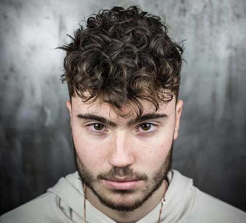 corte de cabelo ondulado longo
