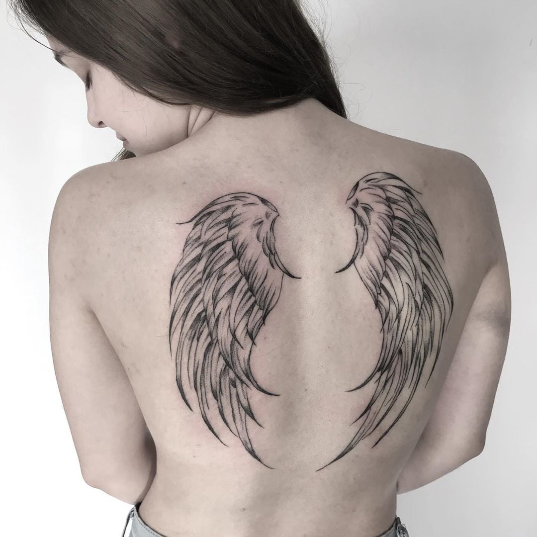tatuagem de asas nas costas