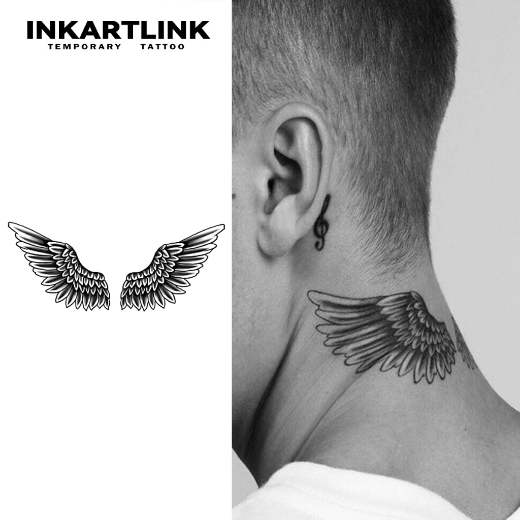 tatuagem de asas nas costas