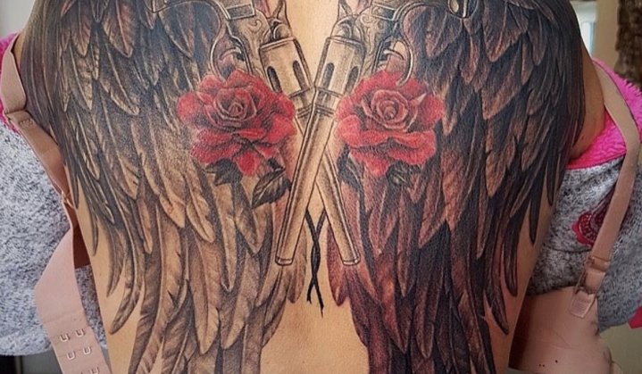 tatuagem de asas nas costas
