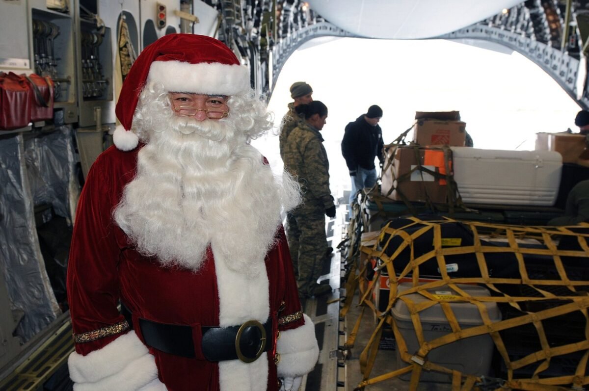 Santa Claus aboard an Alaska Air National Guard C-17 Globemaster military transport aircraft on St. Paul Island, Alaska, Nov. 6, after a successful vi