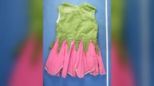 Childs crepe paper 'rosebud' fancy dress costume purchased by mail order from George Court and Sons, Karangahape Road, Auckland, circa 1928